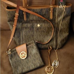Brown Michael Kors large purse and crossbody matching set jewelry comes with!